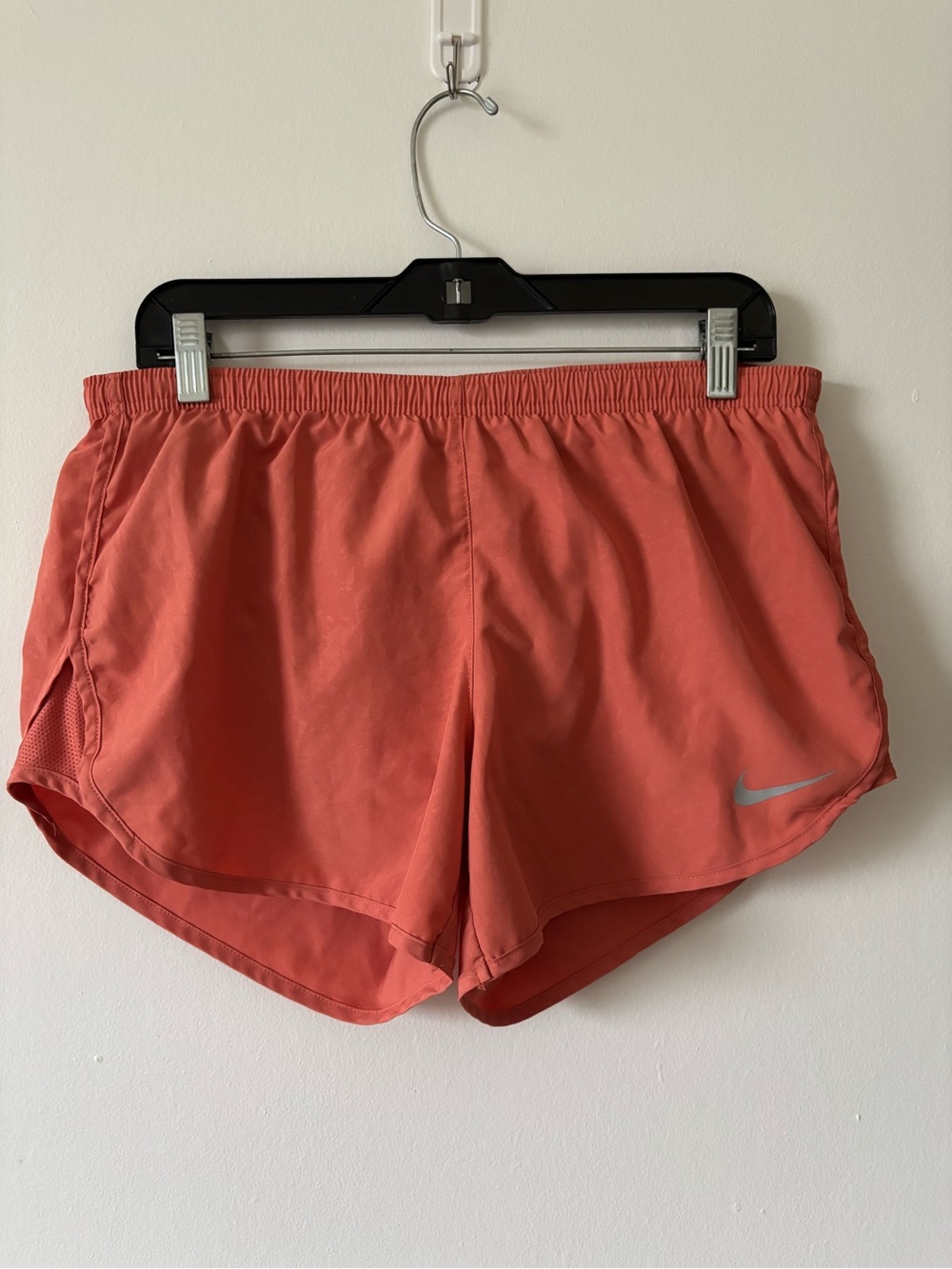Nike Women’s Coral-Red Athletic Shorts with Reflective Swoosh